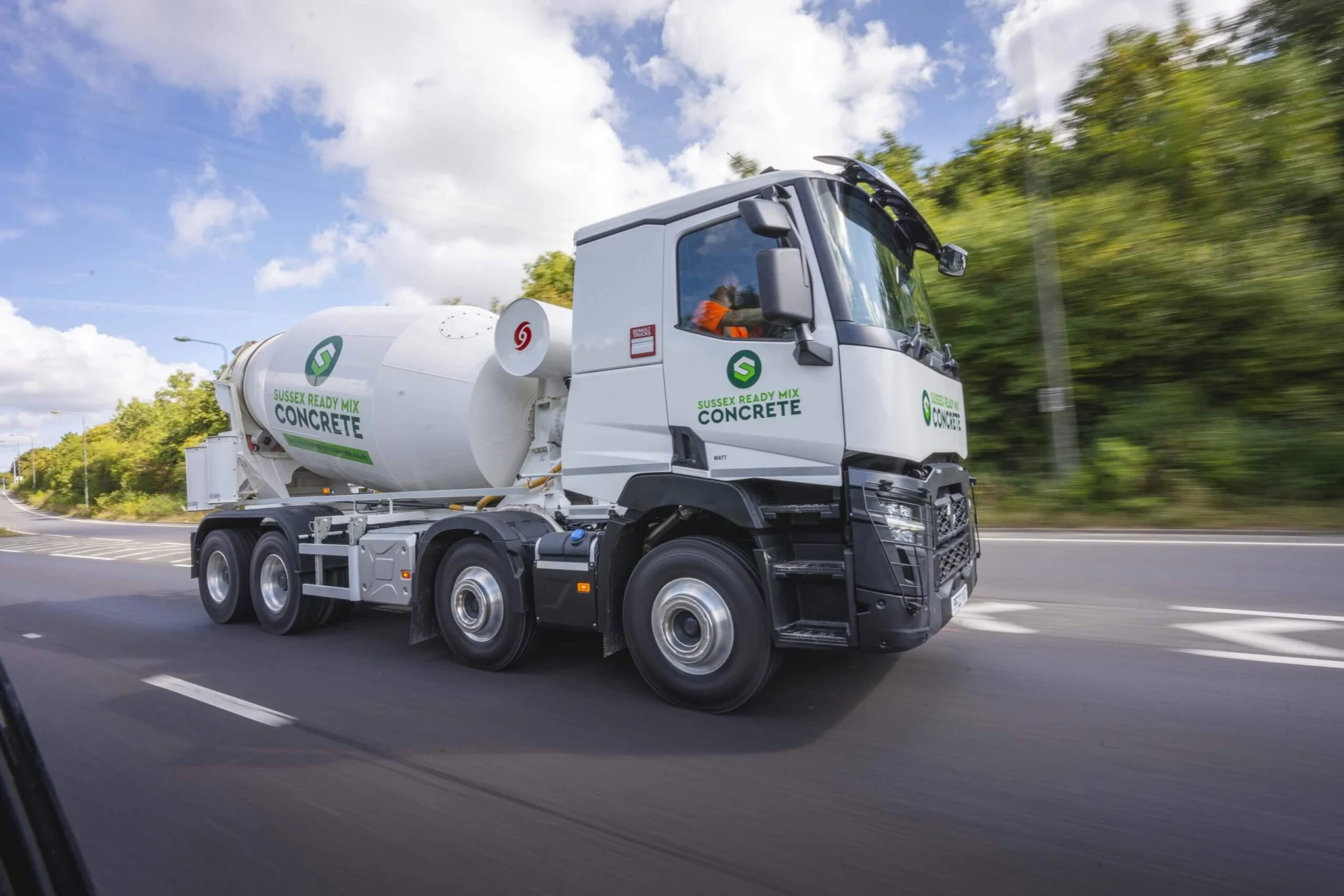 Sussex Ready Mix Concrete mixer on the road
